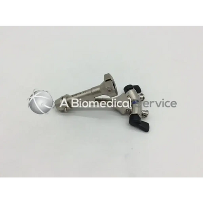 Silver olympus a20977a horn bridge adapter with spherical cross-hatched tip and black ergonomic handles surgical instrument