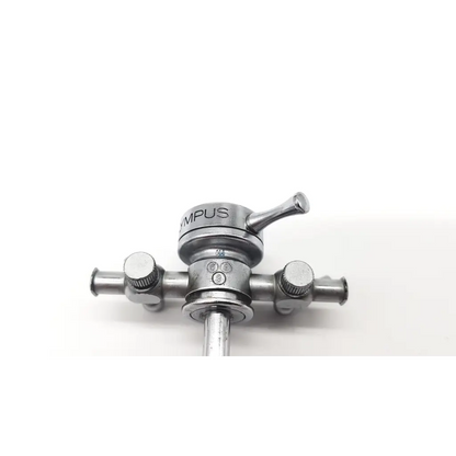 Silver metallic olympus a2214 dual valve cysto sheath 22.5fr with central shaft and two knurled adjustment knobs
