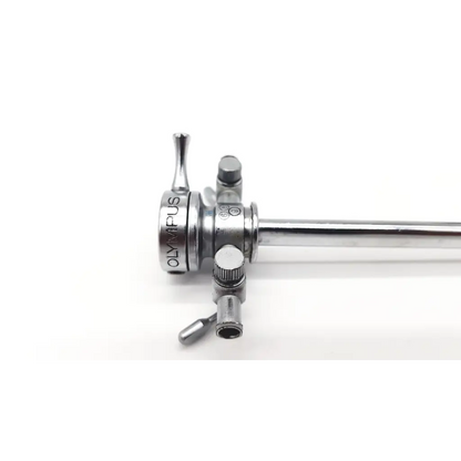Silver metallic olympus a2214 dual valve cysto sheath 22.5fr with long cylindrical shaft and multiple adjustment knobs