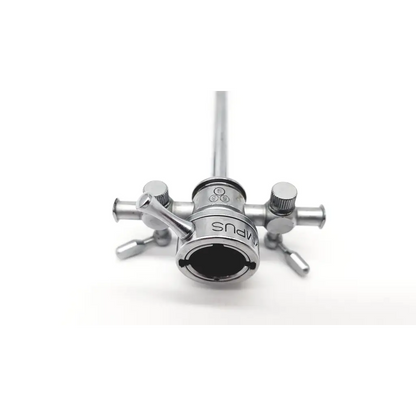 Silver metallic olympus a2214 dual valve cysto sheath with cylindrical body, four adjustable knobs, and wpu engraving