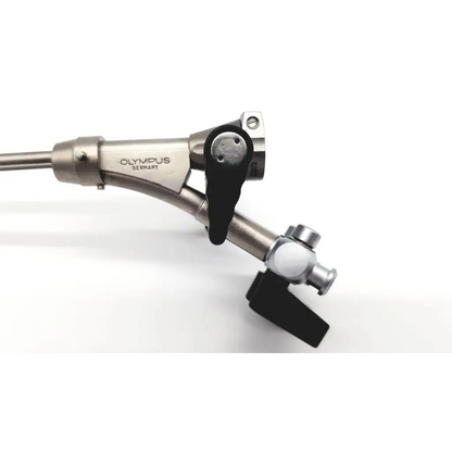 Silver metallic olympus a2972 dual channel deflector surgical instrument with black ergonomic handles and curved shaft