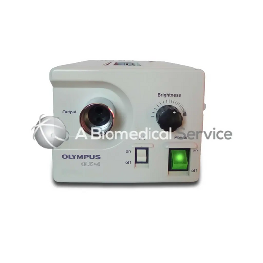 White olympus clk-4 light source system with black brightness dial green power light and output port for biomedical service