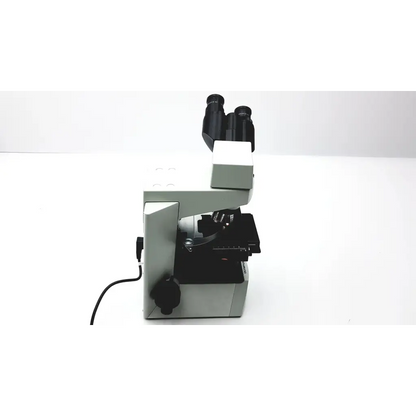 Silver and black olympus cx41rf microscope with dual eyepieces designed for advanced laboratory use