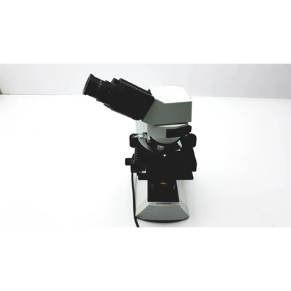 Black and silver olympus cx41rf microscope with dual eyepieces and sturdy base for laboratory use