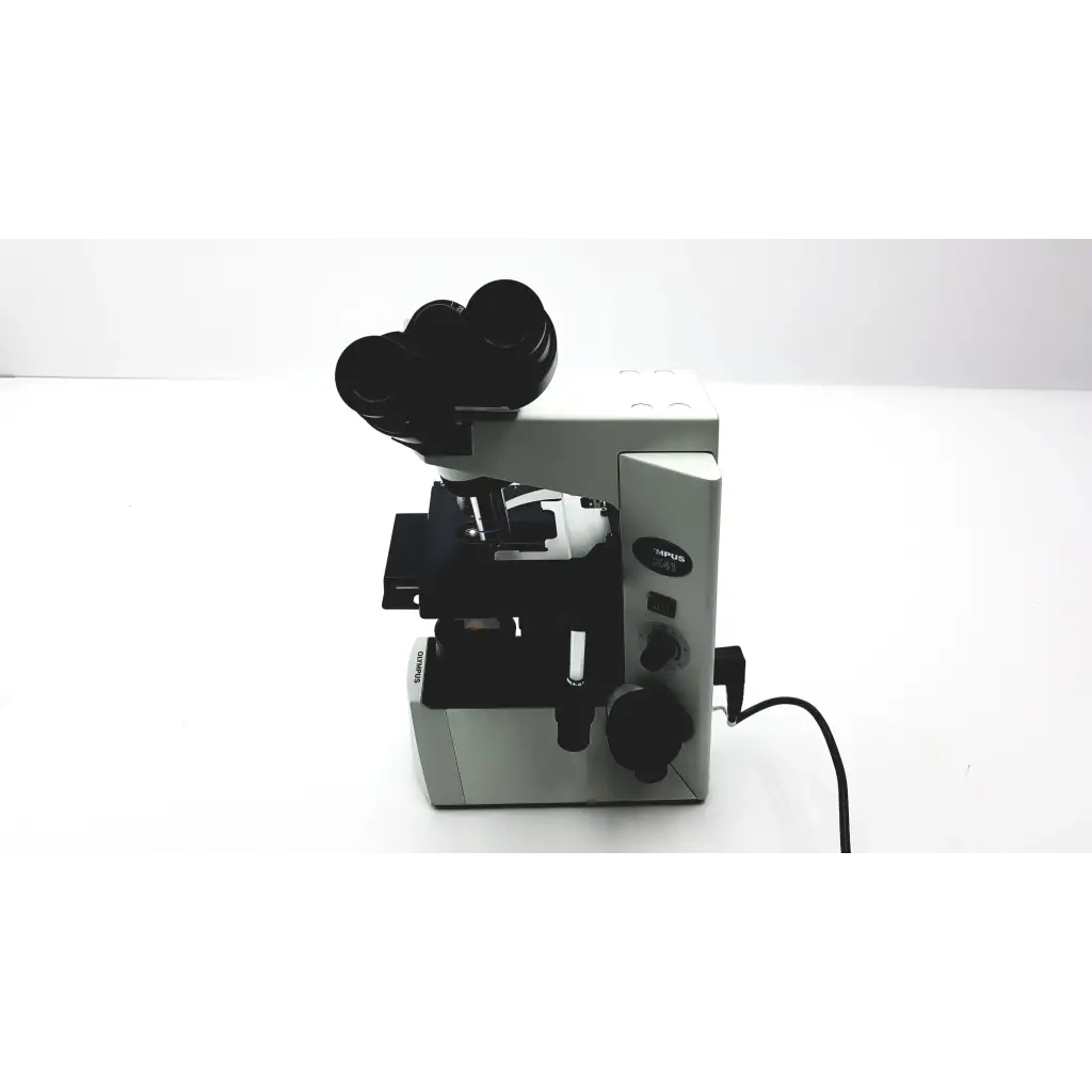 Olympus cx41rf microscope featuring a sleek silver and black compound design with dual eyepieces and sturdy base