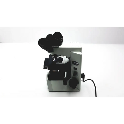 Olympus cx41rf microscope featuring a sleek silver and black compound design with dual eyepieces and sturdy base
