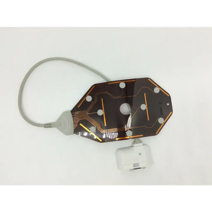 A sleek dark brown flexible circuit board with gold conductive traces and white connectors for olympus endocapsule maj-2031 antenna