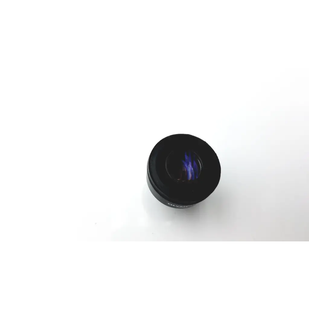 Black cylindrical olympus japan wk 10x 20l eyepiece lens with reflective purple tinted glass surface