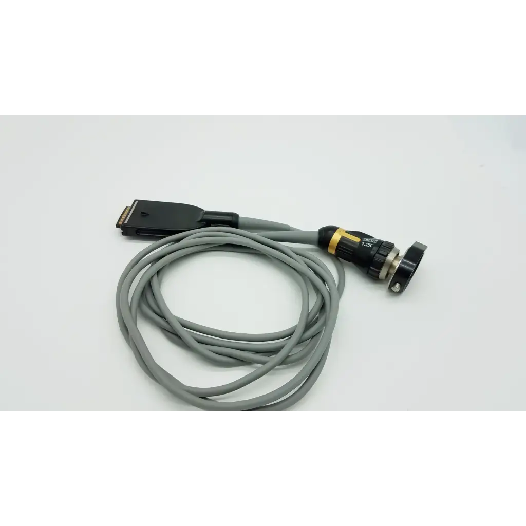 Gray coiled cable with black connector and threaded coupling with gold accents for Olympus OTV-S7ProH autoclavable camera head