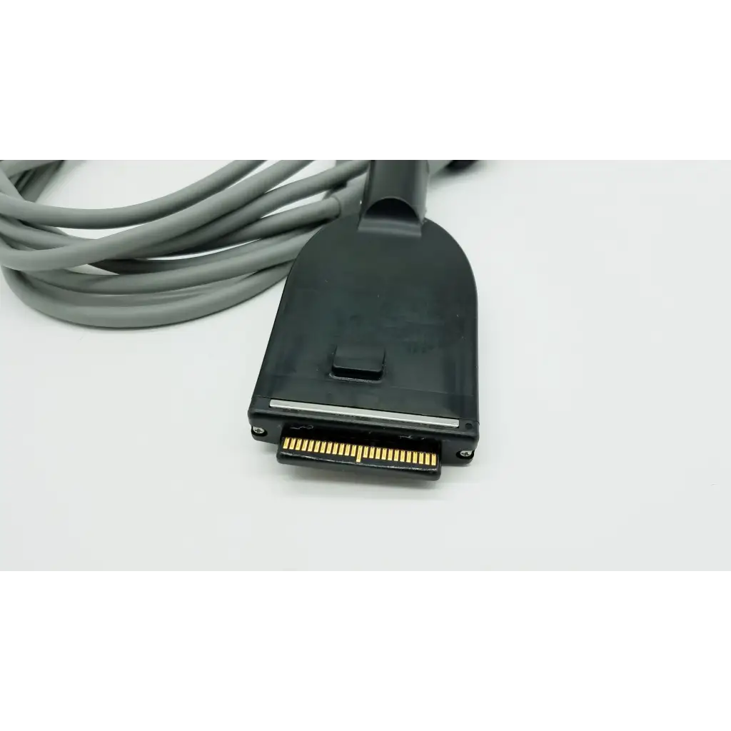 Black plastic connector with gold pins and gray coiled cable for olympus otv-s7proh hd autoclavable camera head back side