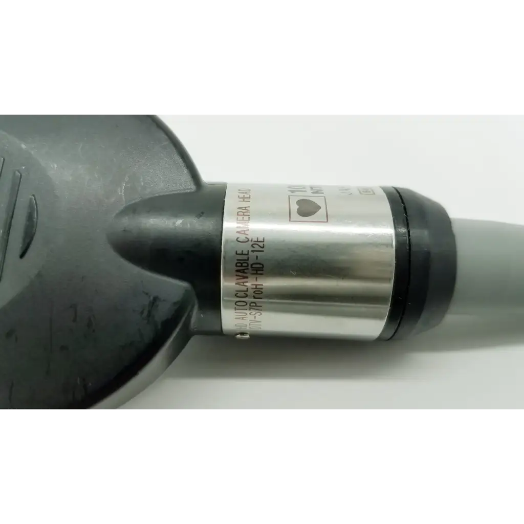 Silver and black autoclavable camera head with metallic band and engraved text for Olympus OTV-S7ProH-HD-12E product