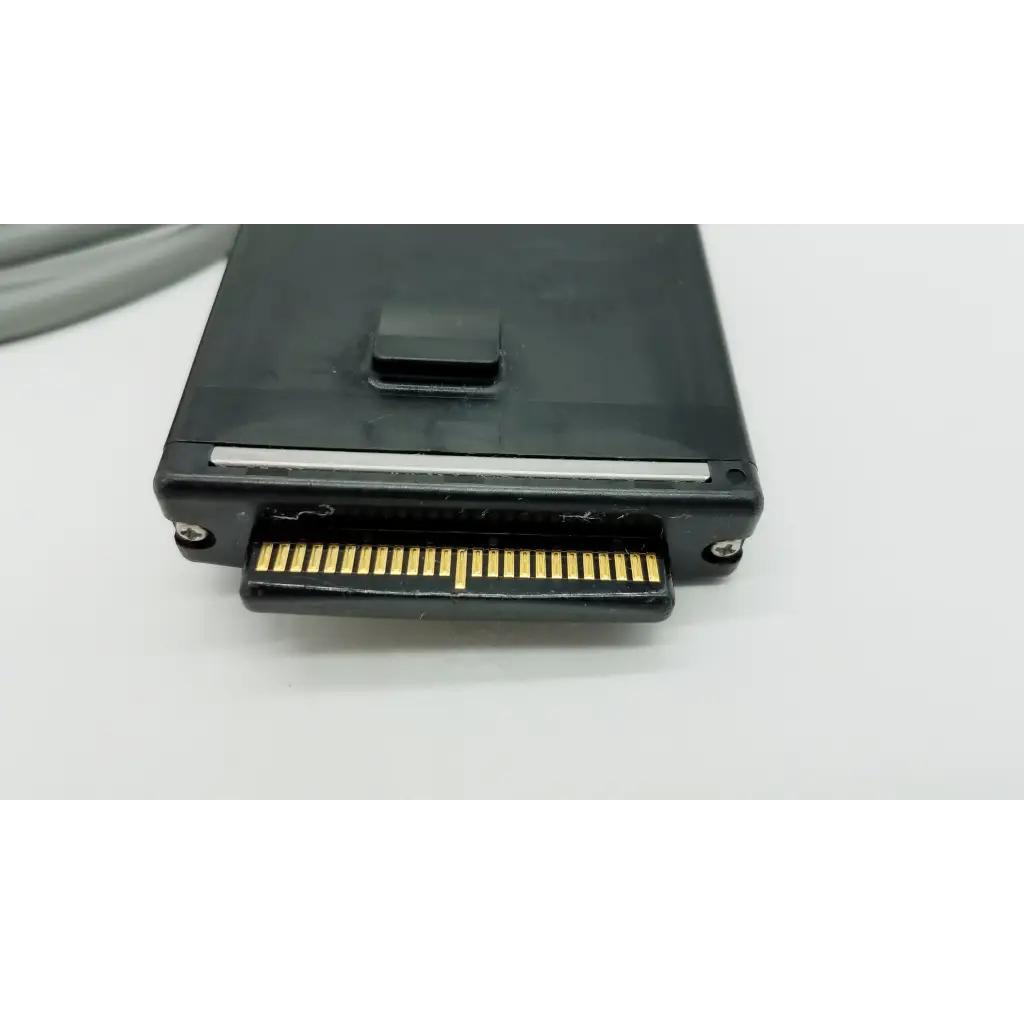 Black rectangular external hard drive with gold connector and latch for olympus otv-s7proh hd autoclavable camera head