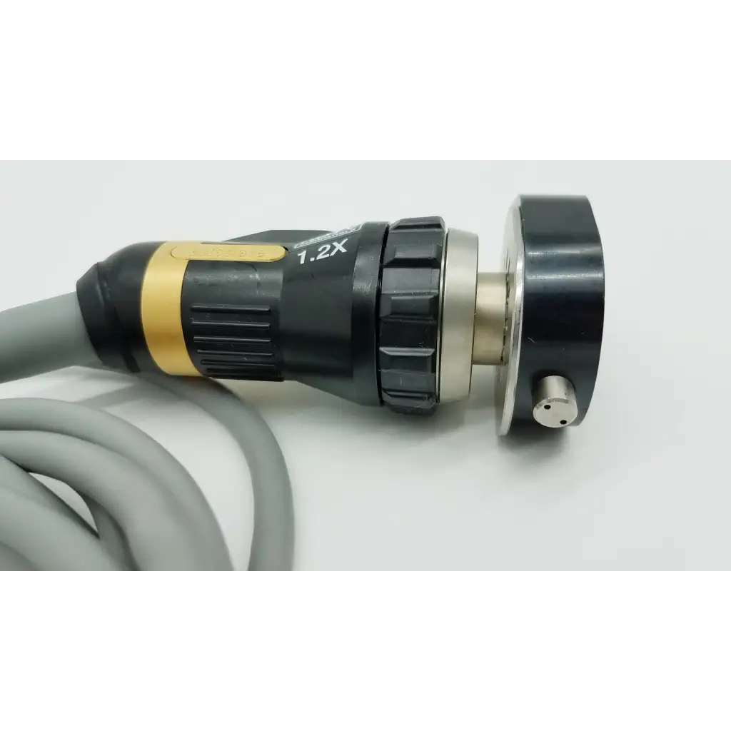 Olympus OTV-S7ProH-HD-12E black and gold autoclavable camera head with 1.2x magnification lens and textured grip sections