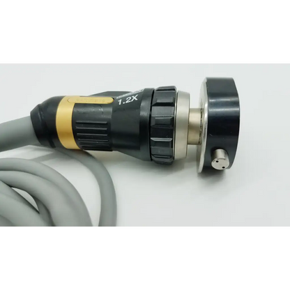 Olympus OTV-S7ProH-HD-12E black and gold autoclavable camera head with 1.2x magnification lens and textured grip sections
