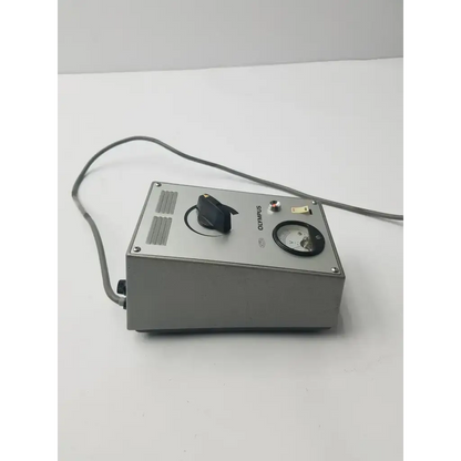 Silver olympus tokyo tf adjustable lamp power supply with black rotary knob and circular gauge for adjustable lamp power