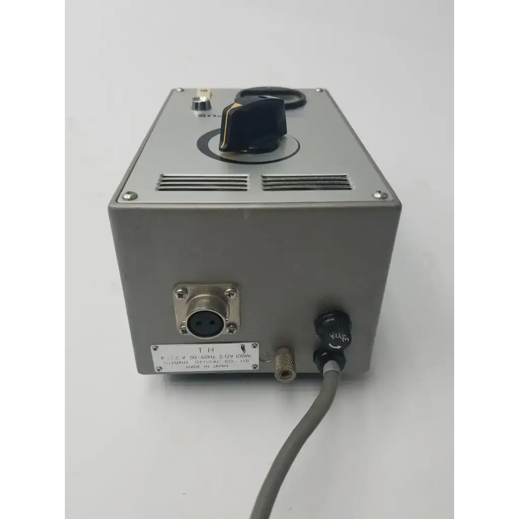 Silver metallic olympus tokyo tf adjustable lamp power supply with black rotary knob for adjustable lamp power use