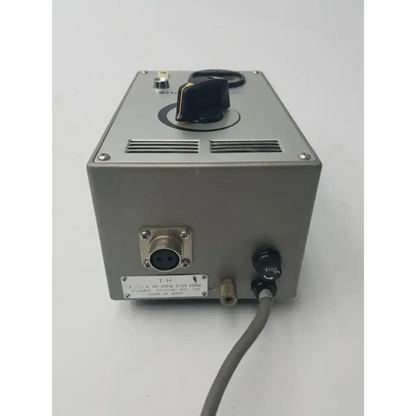 Silver metallic olympus tokyo tf adjustable lamp power supply with black rotary knob for adjustable lamp power use