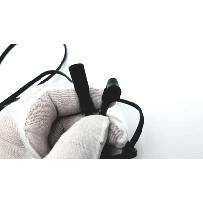 Black olympus wa00014a bipolar lavalier microphone with sleek cylindrical body and attached 4m cable