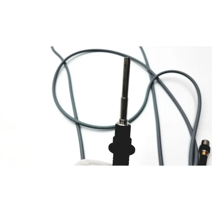 Black-handled soldering iron with metallic tip and coiled black cable for olympus wa03200as fiber optic light cable use