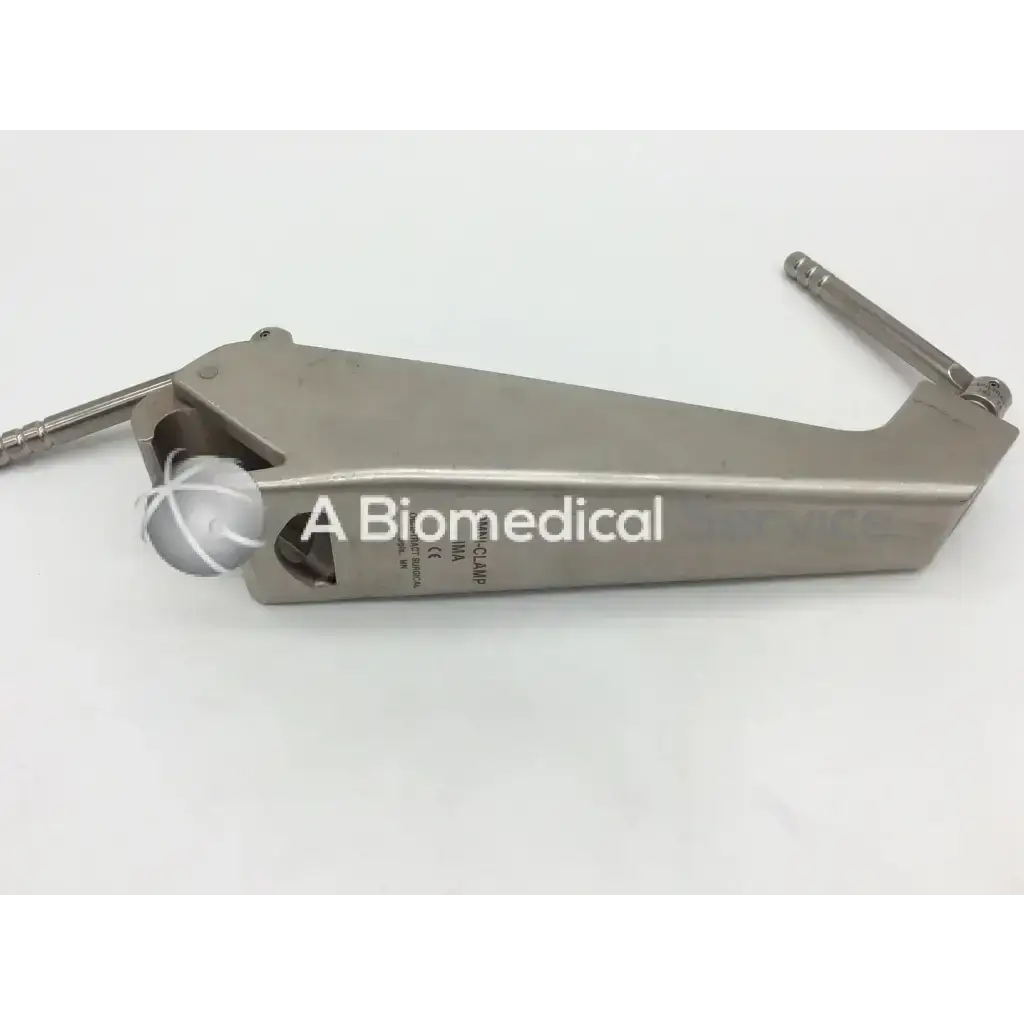 Silver metallic Omni-tract 3635 ima retractor rail clamp with white spherical component and engraved branding