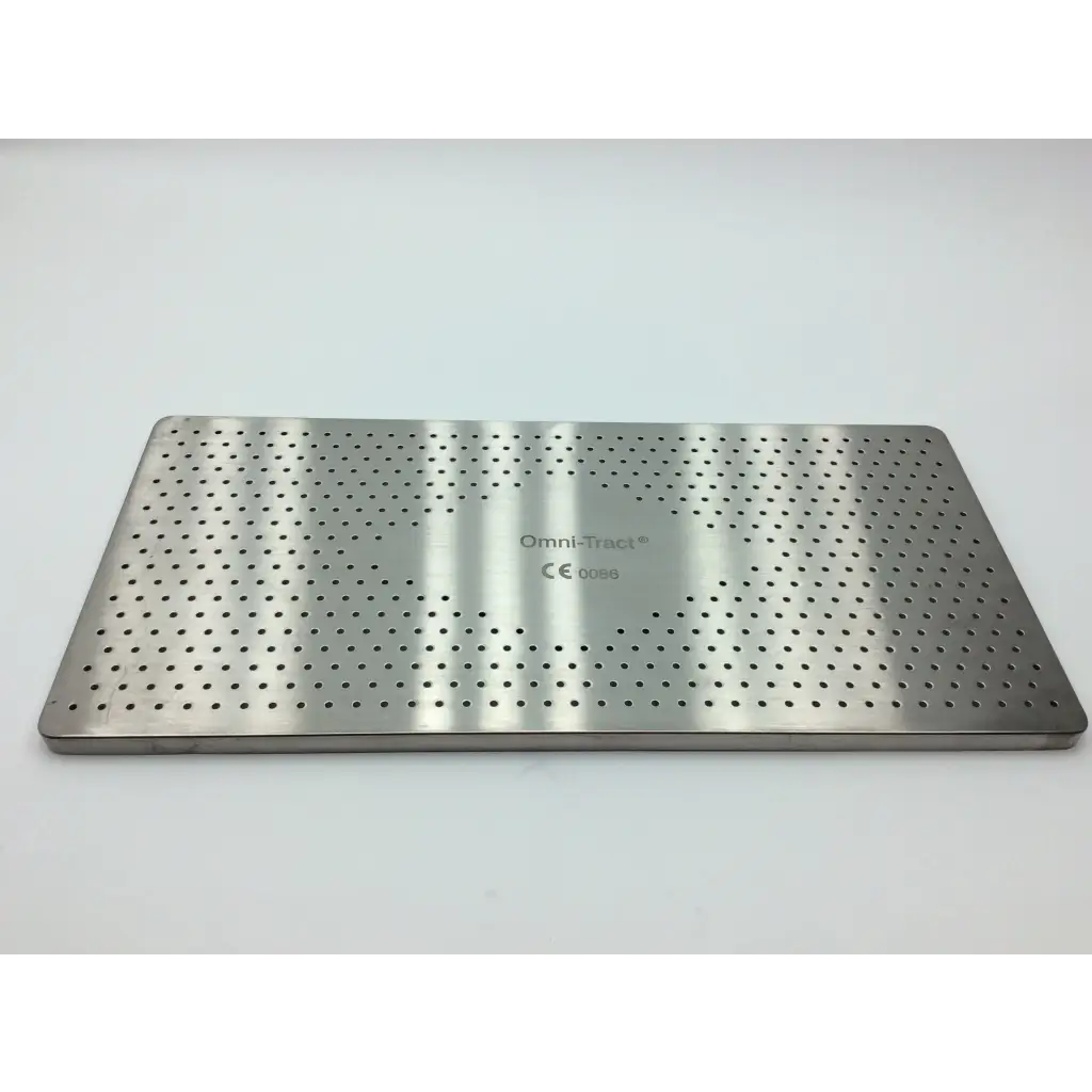 Silver perforated stainless steel surgical tray with engraved branding for autoclave storage case use
