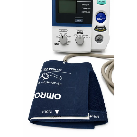 Navy blue fabric blood pressure cuff with white branding and measurement markings for professional digital blood monitor