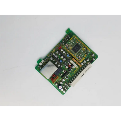 Green printed circuit board with black integrated circuit chip in omron xc5a50421 4500 series bbcb2-11 22523sm