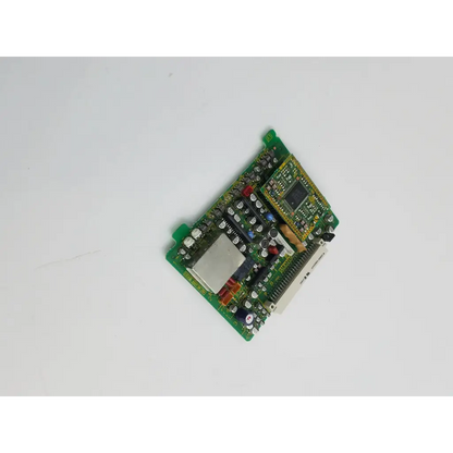 Green circuit board with silver rectangular chip and electronic components of omron xc5a50421 series bbcb2-11 22523sm