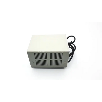 Beige rectangular oneac md1103 four outlet power conditioner with black coiled cable and vertical ventilation grilles on side