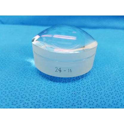 Clear transparent optical dome lens with smooth rounded shape and white base marked 24-11 for Topcon TRC-NW8 retinal camera