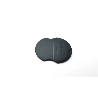 Black plastic oticon hearing aids medium case with smooth rounded shape and embossed branding for microphone cover