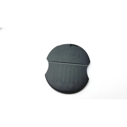 Black silicone carabiner with matte finish and embossed oricon logo shown with oticon t-cap mic for hearing aids