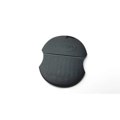 Black rubberized oticon t-cap microphone cover for hearing aids with textured grip and embossed logo in dark brown