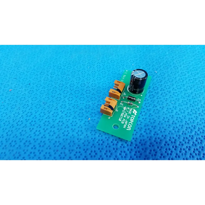Green power circuit board with orange terminal blocks and black capacitor for topcon retinal camera pow pcb model 4042766710