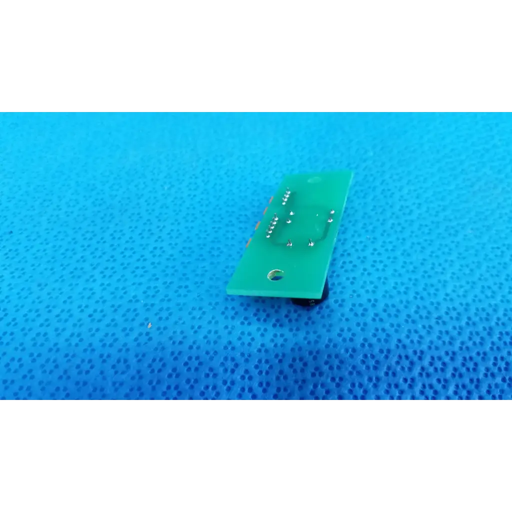 Green rectangular pow pcb power circuit board with silver solder points and central hole for topcon retinal camera