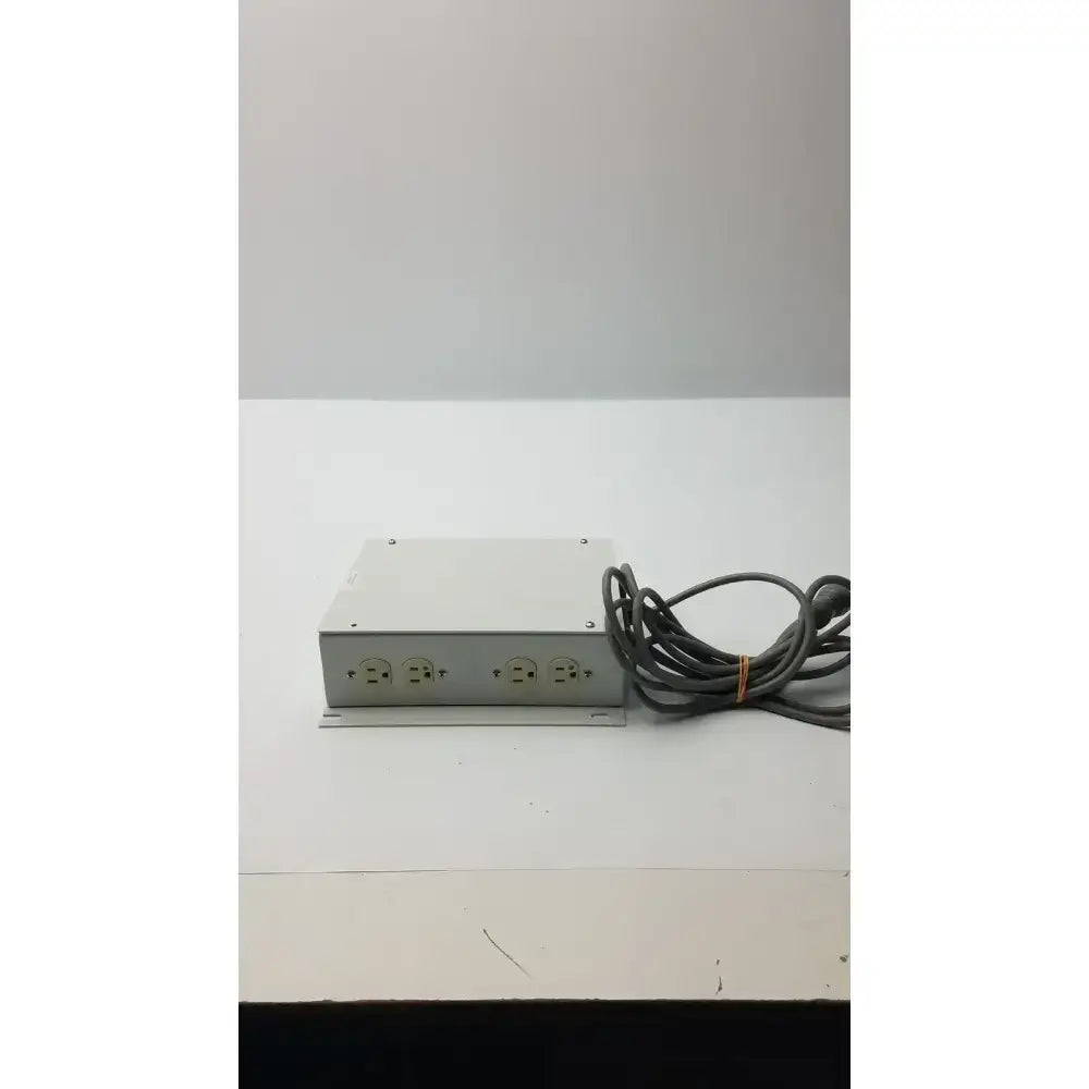 Silver metallic isolation transformer offset power strip with four outlets and coiled gray cord model ita0422 part no 11970-0000-01
