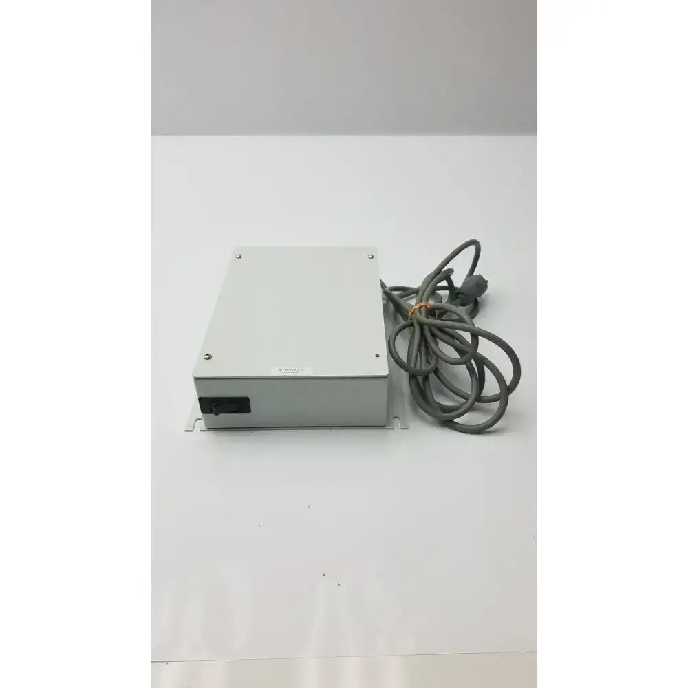 Gray rectangular isolation transformer offset controller unit with coiled gray cable part no 11970-0000-01 ITA0422