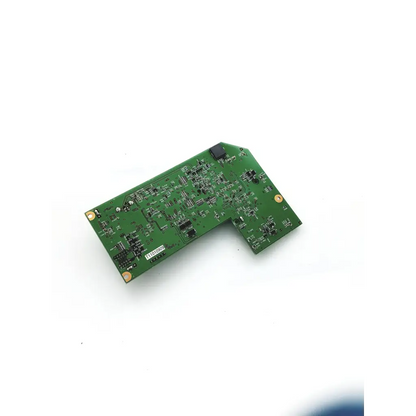 Green l-shaped pb-free t8a0494 board with electronic components and a small black chip for electronic applications