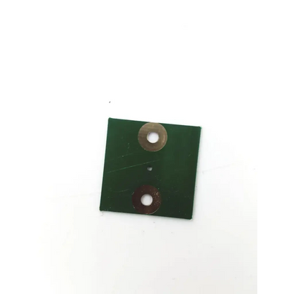 Green rectangular 25mm control board with two circular metallic washers for precise 1.25mm control use in PB K750158.00