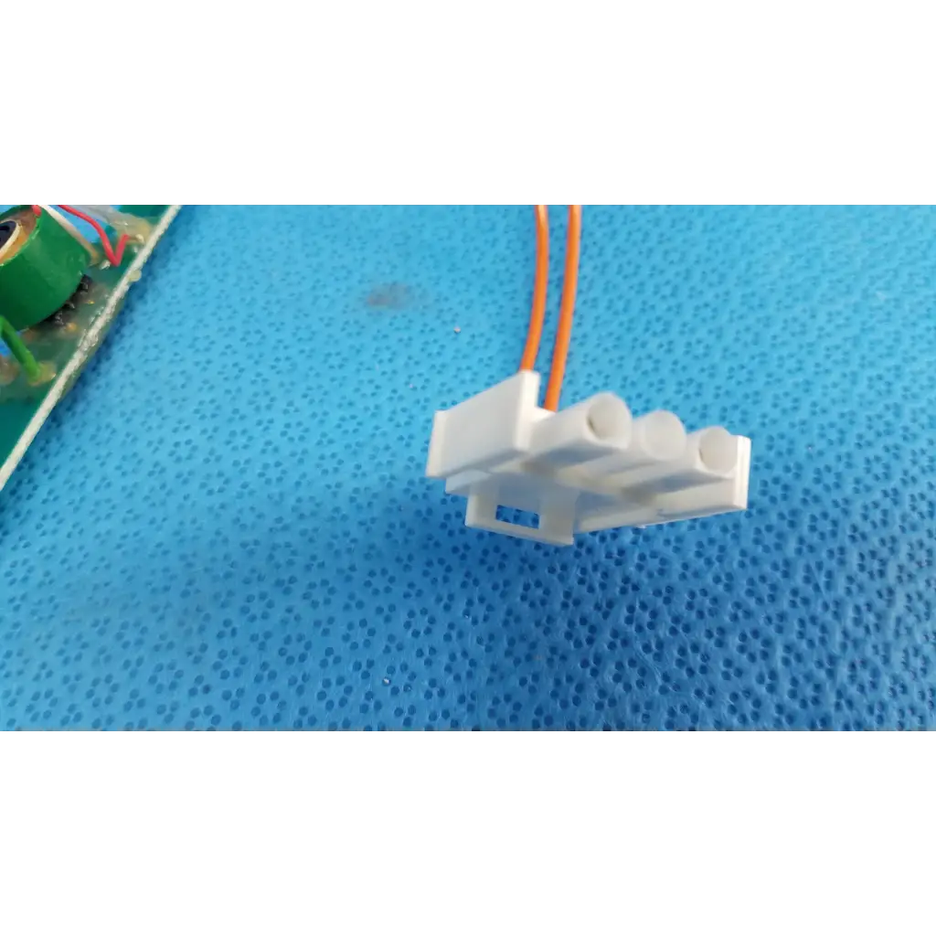 White plastic harness assembly with two orange wires for trc-nw6s circuit board in topcon retinal camera