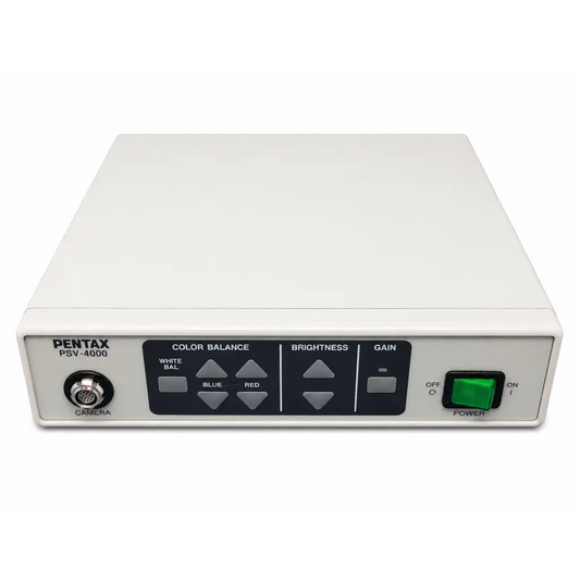 White rectangular pentax psv-4000 medical video processor with black panel gray buttons and green power switch
