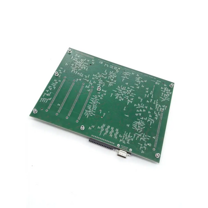 Green rectangular printed circuit board with silver soldered components and usb connector for biomedical service replacement parts