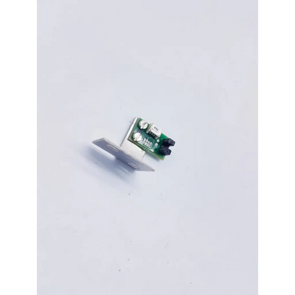 Green circuit board with silver screws and black connectors mounted on white bracket perkinelmer precisely wizard2 optocoupler sensor