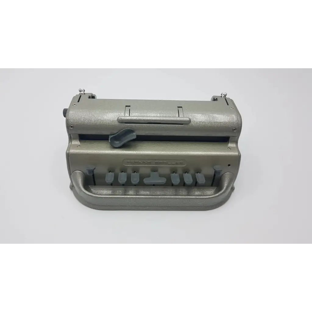 Perkins classic brailler manual typewriter in gray metal with black plastic keys for braille writing and accessibility