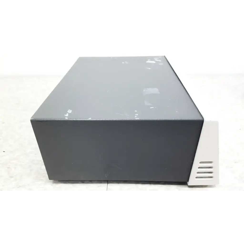 Dark gray Pharmacia Biotech electrophoresiis power supply EPS 300 with matte finish and white ventilation slats on the side