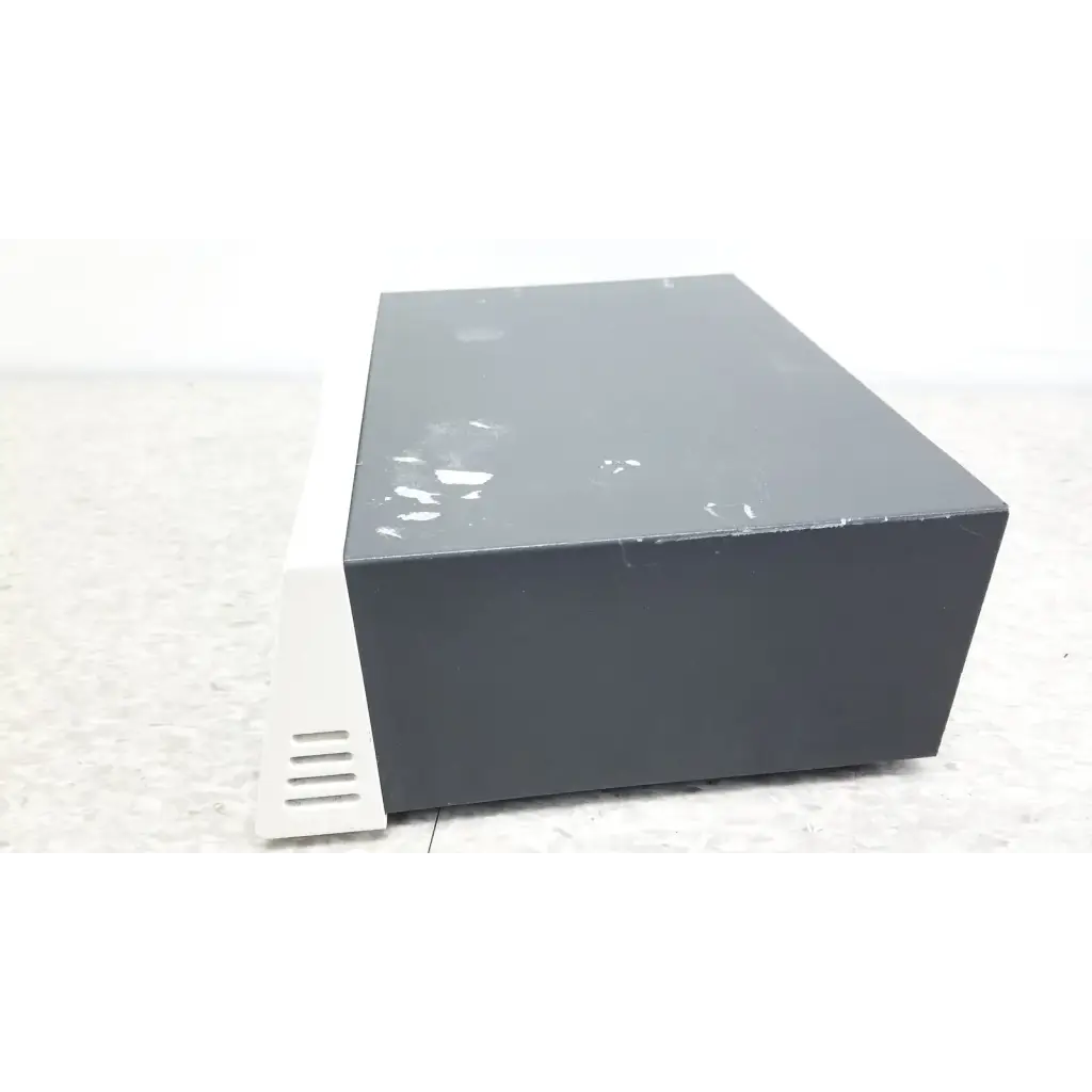Black rectangular pharmacia biotech electrophoresiis power supply eps 300 with matte finish and white ventilation slats on side