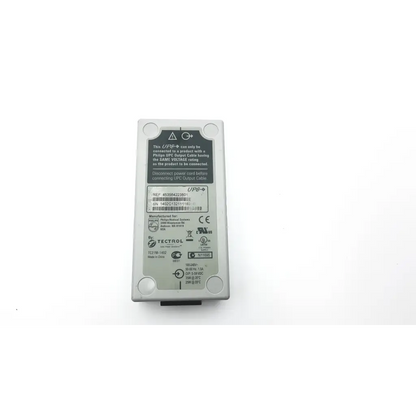 Gray rectangular philips tectrol tc21m-1402 power supply with rounded corners and black connector at the bottom