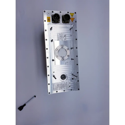 Silver metallic philips bv pulsera industrial control module with two black circular connectors and warning labels backside