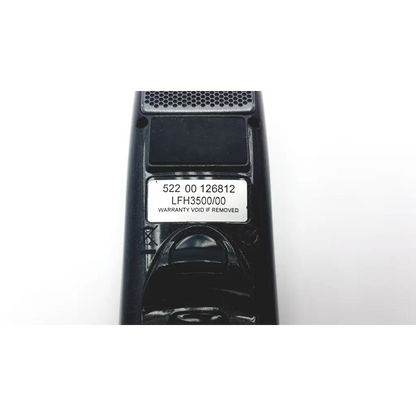 Black plastic philips dictation precision microphone remote control with white serial number label on back side