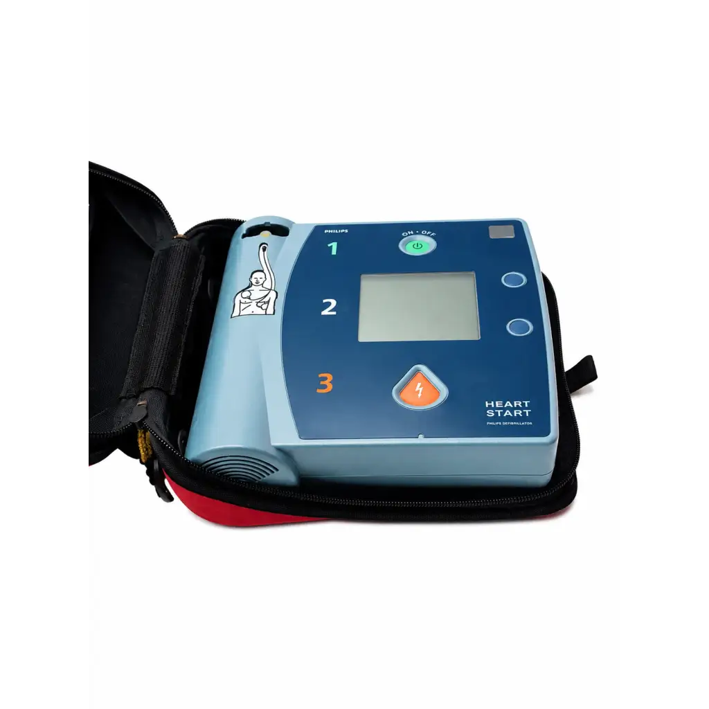 Blue philips m3860a aed defibrillator in black and red carrying case for emergency use as an aed defibrillator complete kit
